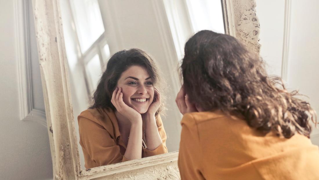 photo of woman looking at the mirror 774866 111948858659